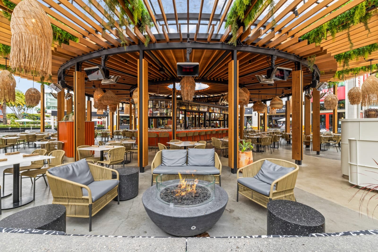 Commercial outdoor dining space with Bromic porch heaters installed overhead